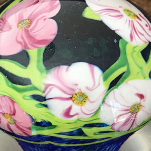 Unmarked magnum paperweight with flowers with millefiori center
