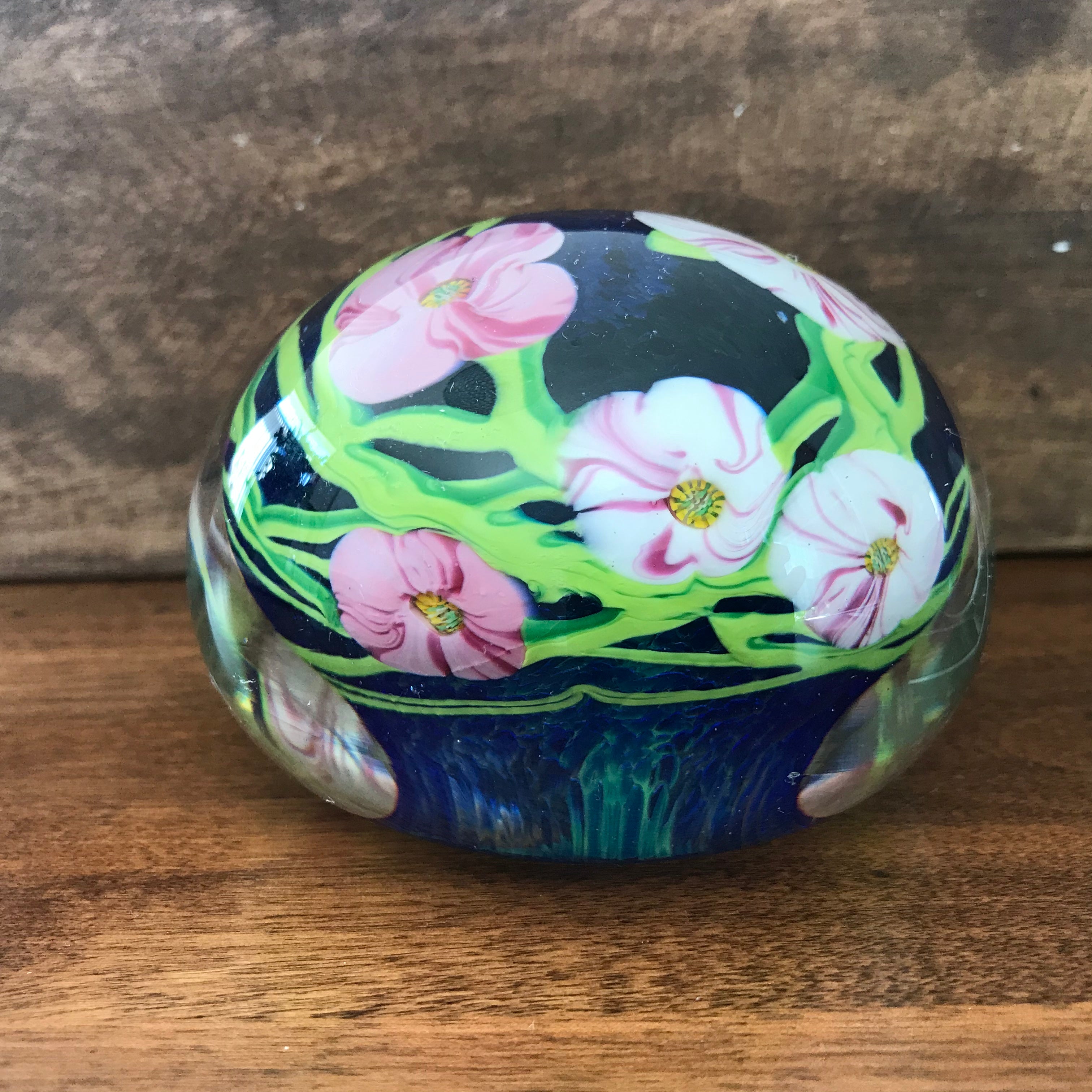 Unmarked magnum paperweight with flowers with millefiori center