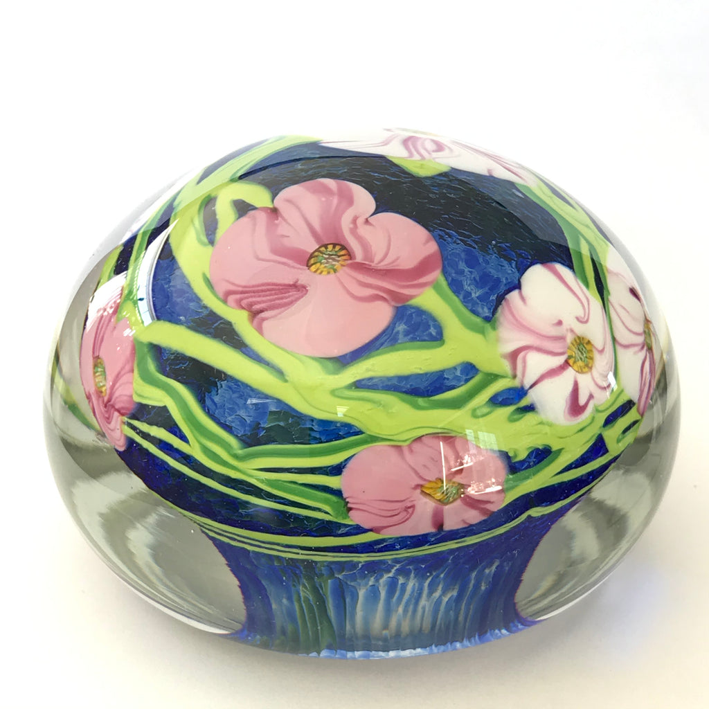 Unmarked magnum paperweight with flowers with millefiori center